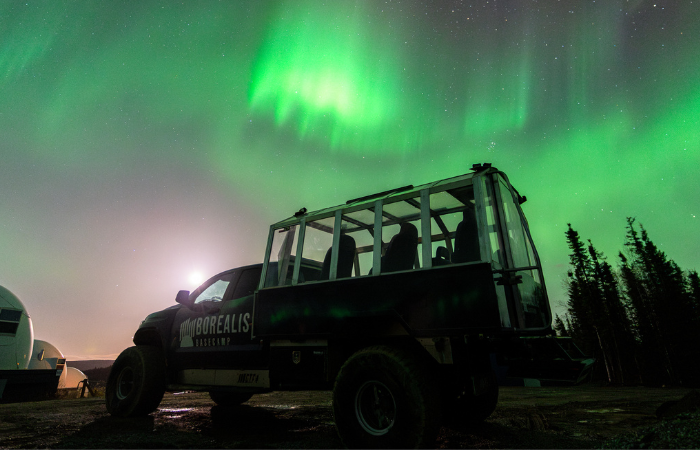 Arctic truck under the northern lights