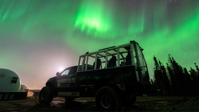 Arctic truck under the northern lights